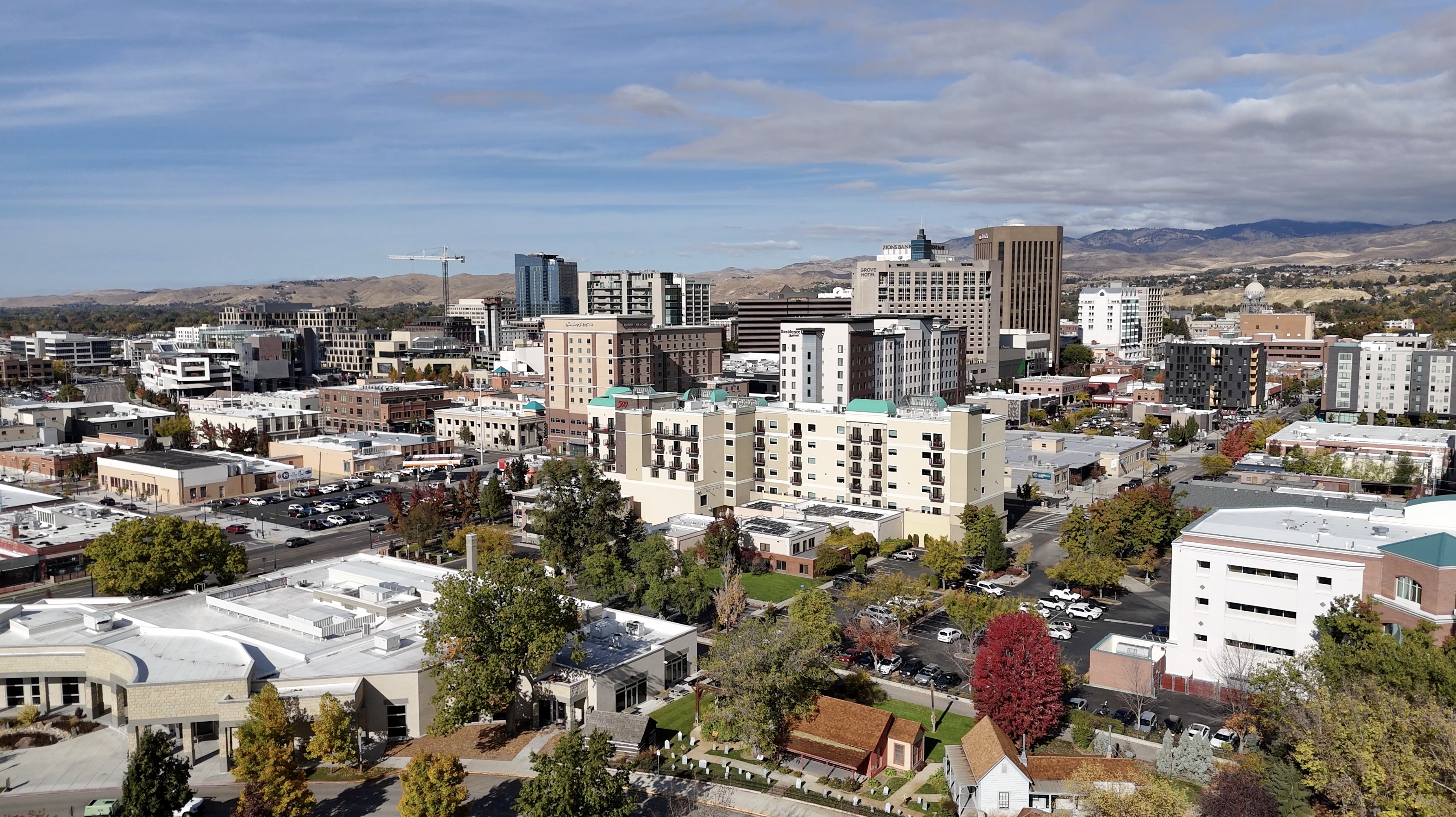 Drone Image of Boise Skyline over Downtown Boise Idaho with buildings and Foothills in the Background 